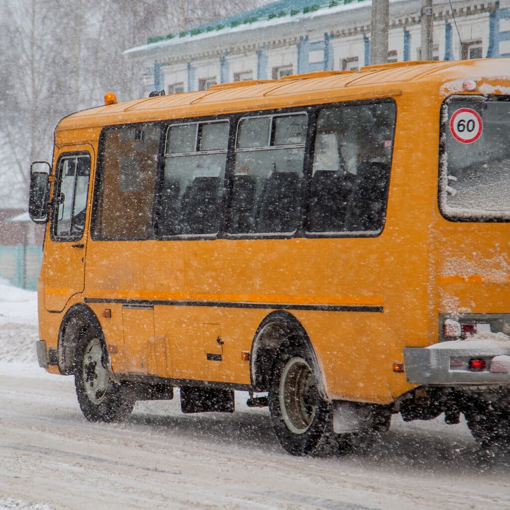 School bus front windshield defrosters